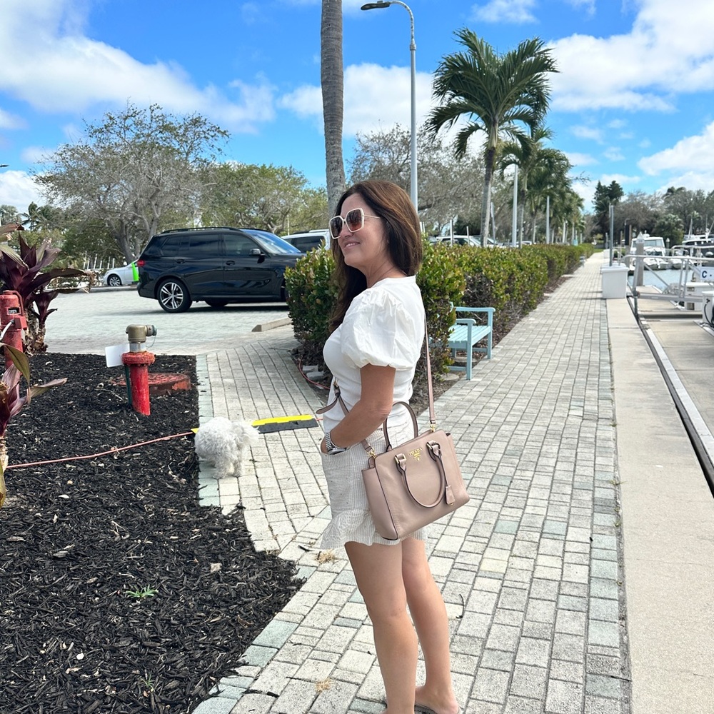 Authentic crossbody and double handle tote from Prada in a pinkish beige. - Picture 2 of 15